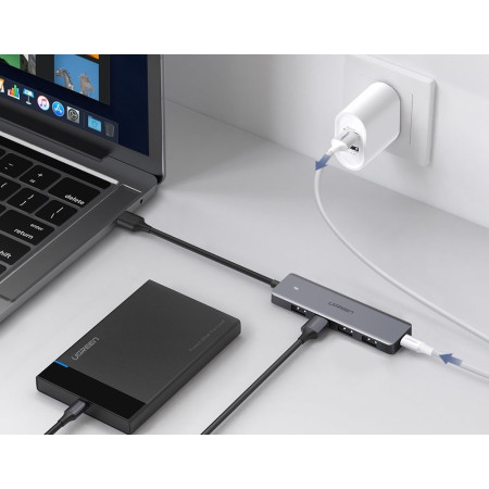 Ugreen CM219 USB-A šakotuvas 4xUSB-A (MicroUSB maitinimui) pilkas